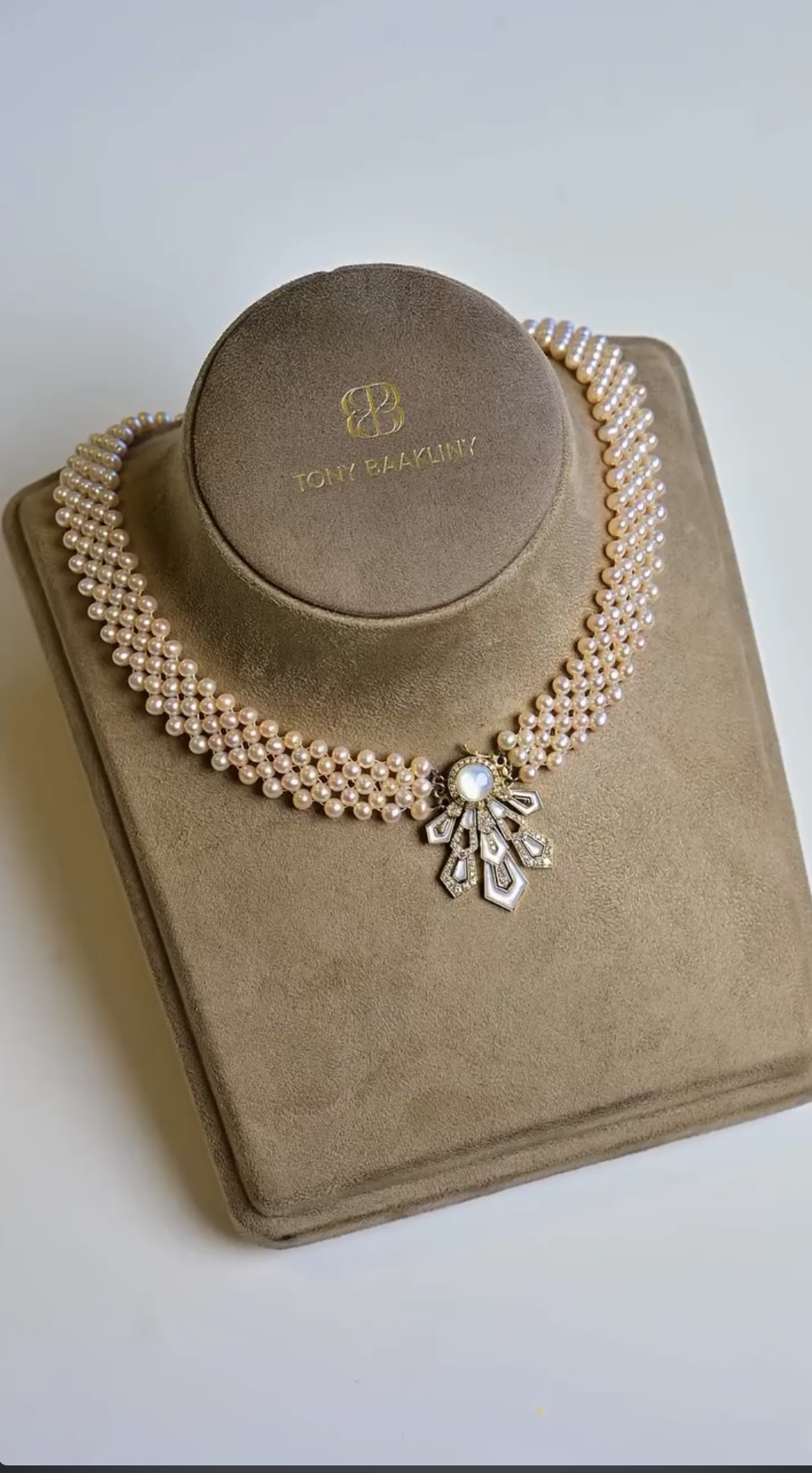 18K gold Nour Al Lulu necklace with multi-strand cultured pearls and mother-of-pearl diamond pendant
